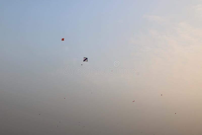 Kite Flying in Blue Sky on Kite Flying Day Stock Photo Image of chain