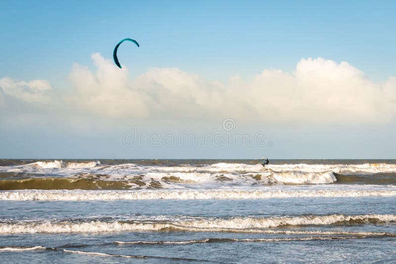 Kite surfing in wintertime on the North Sea