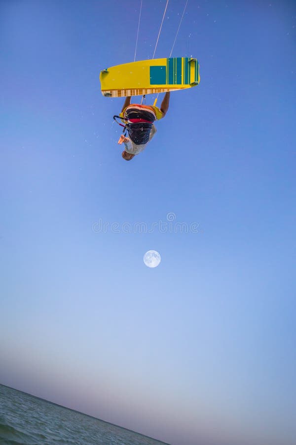 Kiteboarding. Fun in ocean. Extreme Sport Kitesurfing.