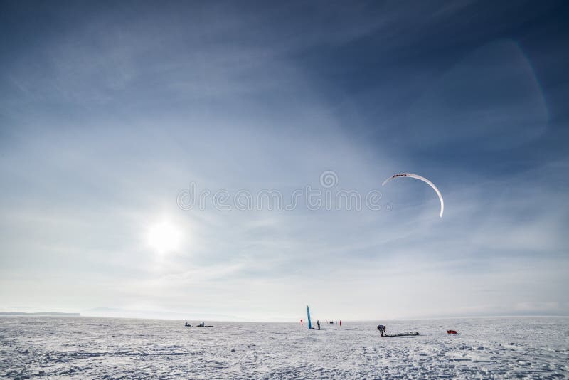 Kiteboarding on snow stock image. Image of freezing, active 35691757