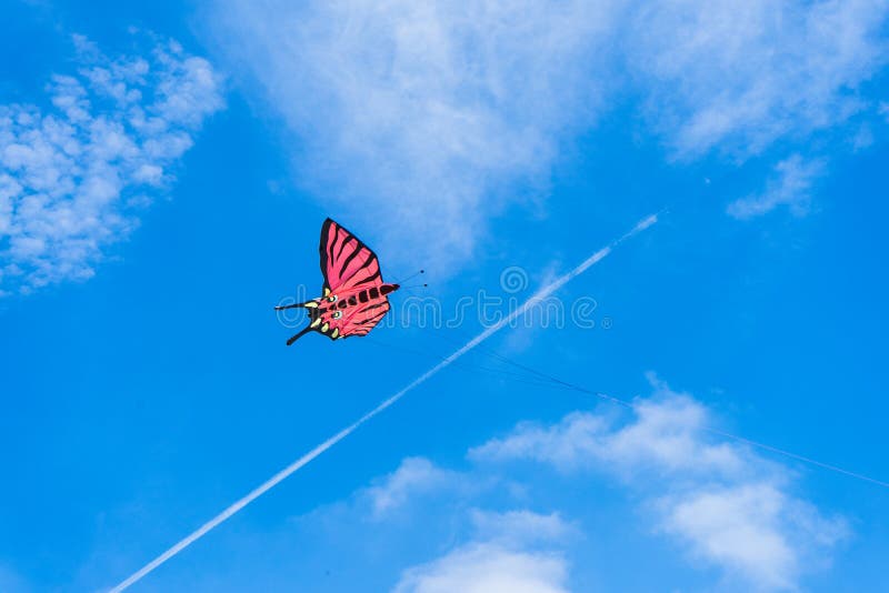 Kites Flying in the Sky among the Clouds.Kite Festival Stock Photo