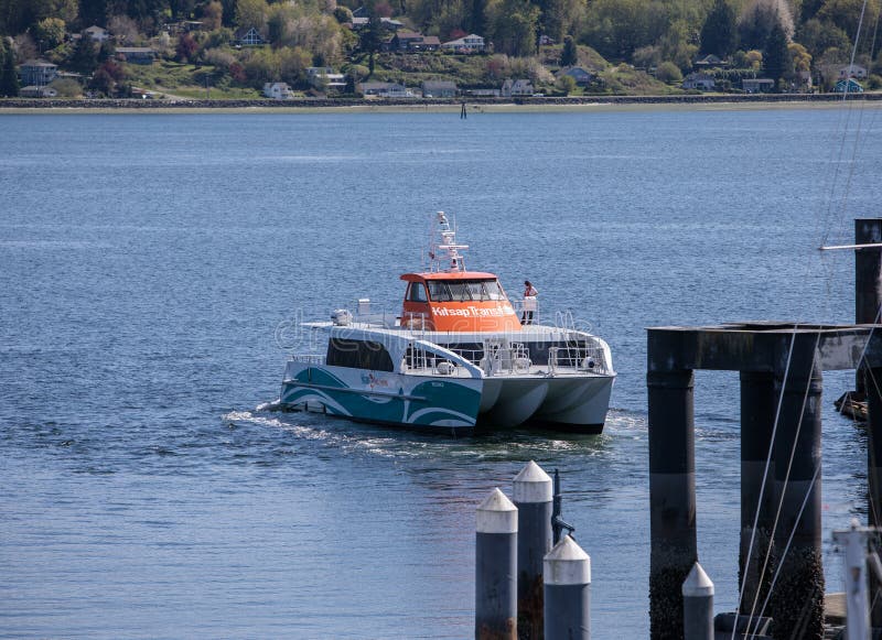 A Kitsap Fast Ferry departs the Bremerton port royalty free stock photography