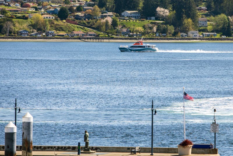 A Kitsap Fast Ferry departs the Bremerton port royalty free stock images