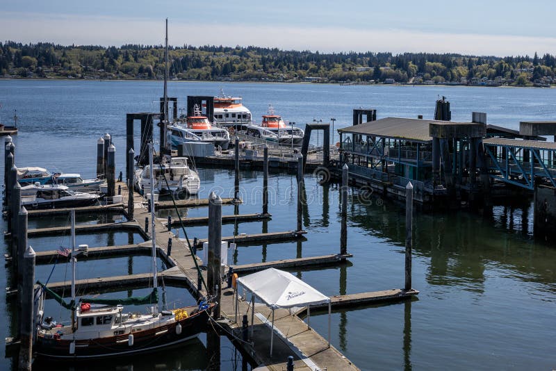 A Kitsap Fast Ferry departs the Bremerton port stock photo