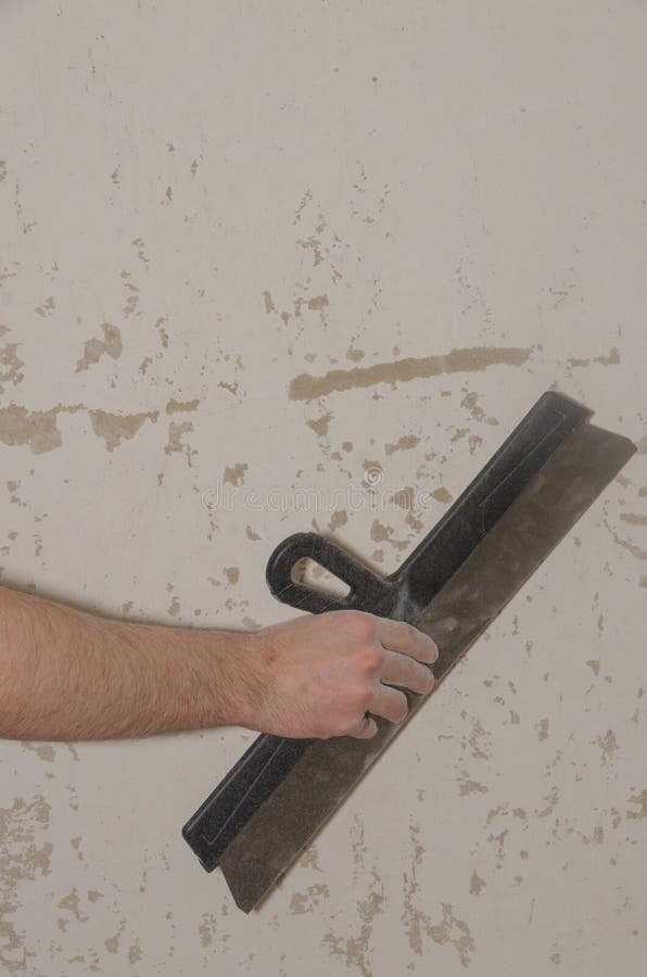 Kitt arbeitet in der Wohnung, Reparatur stockbilder Kitt arbeitet in der Wohnung, Reparatur stockbilder