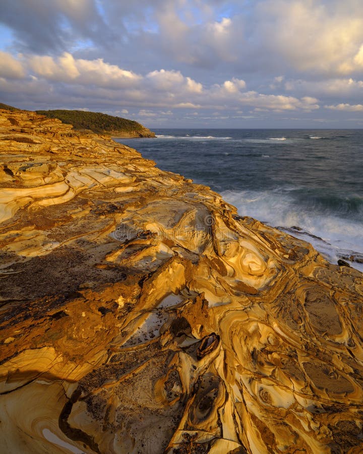 Kitta stranden p? solnedg?ngen, den Bouddi nationalparken, den centrala kusten, NSW, Australien arkivfoton Kitta stranden p? solnedg?ngen, den Bouddi nationalparken, den centrala kusten, NSW, Australien arkivfoton