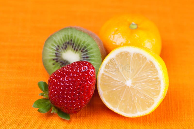 Kiwi,lemon,mandarin and Strawberries Stock Photo - Image of fruit