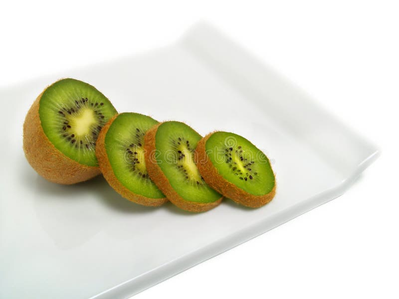 Kiwi slices on cutting board