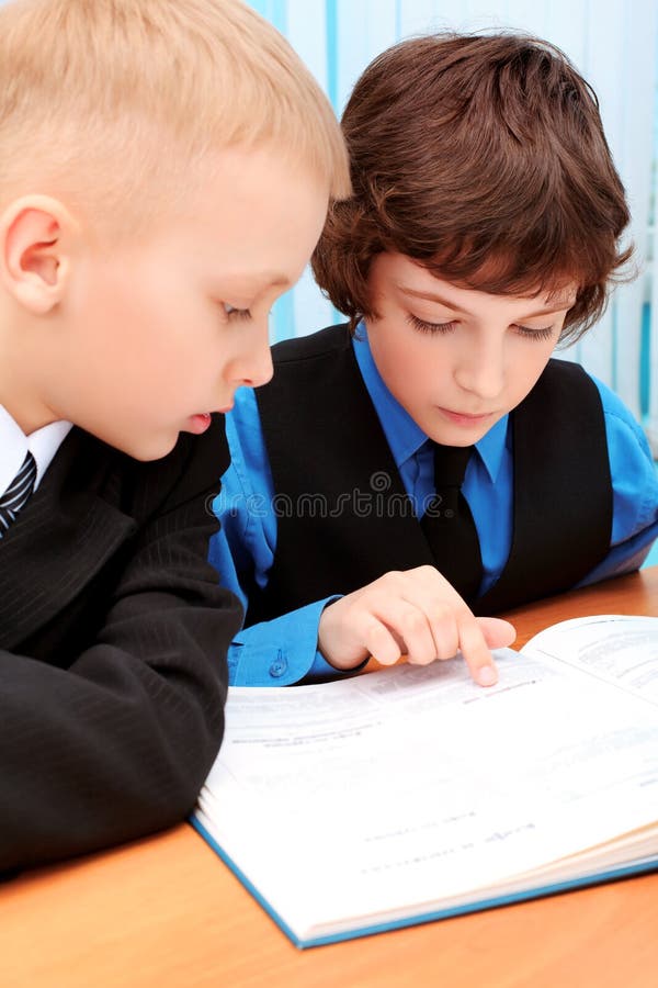 Portrait of a schoolboys in a classroom. Portrait of a schoolboys in a classroom.