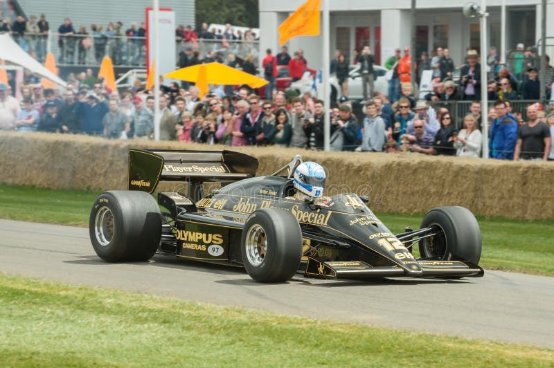 Tom Kristensen driving the classic Ayrton Senna JPS Lotus F1 racing car on the hill course at Goodwood, UK on July 1, 2012. Tom Kristensen driving the classic Ayrton Senna JPS Lotus F1 racing car on the hill course at Goodwood, UK on July 1, 2012