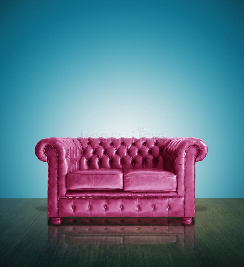 Klassisk rosa lädersofa arkivfoto