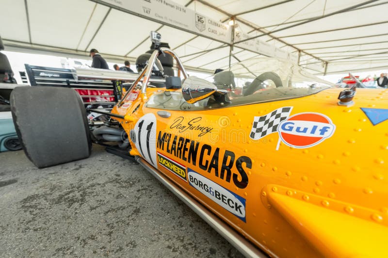 Classic McLaren F1 racing car, originally driven by Dan Gurney in 1970, in the service pits at the Festival of Speed motor-sport event held at Goodwood, UK on July 1, 2012. Classic McLaren F1 racing car, originally driven by Dan Gurney in 1970, in the service pits at the Festival of Speed motor-sport event held at Goodwood, UK on July 1, 2012