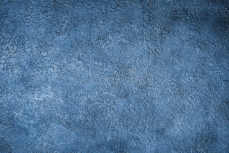 Classic blue stucco background close up, painted rough cement texture backdrop, grunge concrete textured wall, art decorative plaster board, matt dark blue vintage wallpaper, empty place, copy space. Classic blue stucco background close up, painted rough cement texture backdrop, grunge concrete textured wall, art decorative plaster board, matt dark blue vintage wallpaper, empty place, copy space