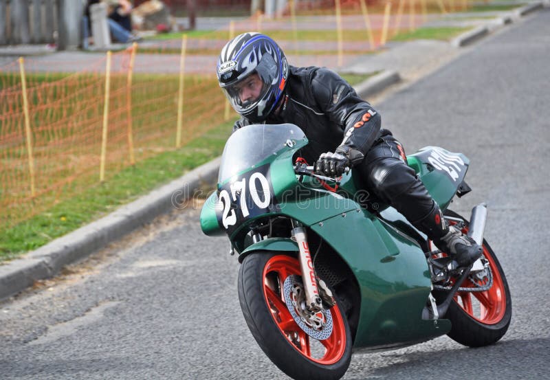 Methven, New Zealand - April 02, 2009: Michael Dawson on a Honda NSR250 competing at the Methven Mountain Thunder street race meeting. Methven, New Zealand - April 02, 2009: Michael Dawson on a Honda NSR250 competing at the Methven Mountain Thunder street race meeting.