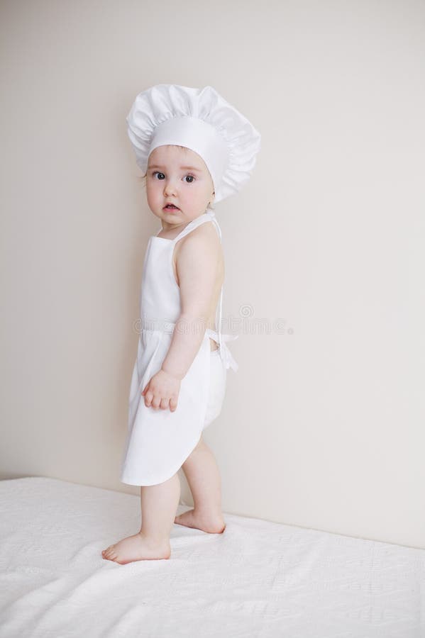 Kleiner Chef auf weißem Hintergrundporträt lizenzfreies stockfoto Kleiner Chef auf weißem Hintergrundporträt lizenzfreies stockfoto