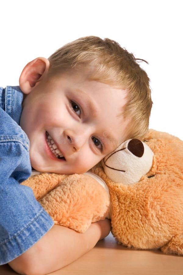 Kleiner Junge und Teddybär lizenzfreie stockbilder Kleiner Junge und Teddybär lizenzfreie stockbilder