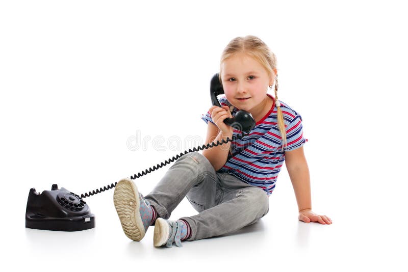 Kleines Mädchen mit altem Retro- Telefon. stockfotos Kleines Mädchen mit altem Retro- Telefon. stockfotos