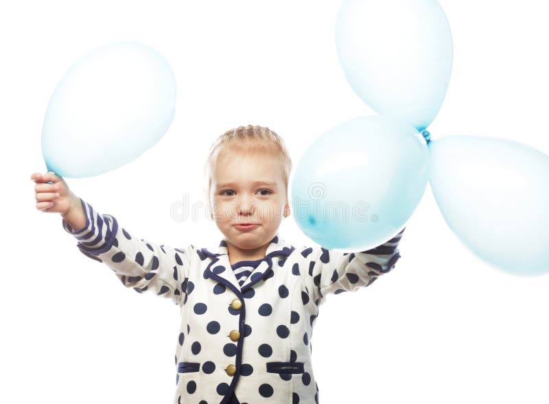 Kleines Mädchen mit blauen Ballonen stockbild Kleines Mädchen mit blauen Ballonen stockbild