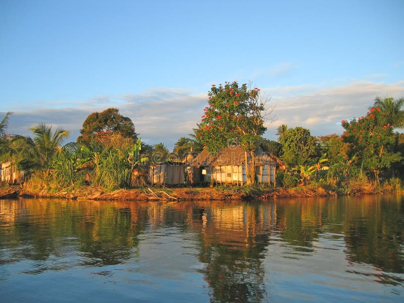 Small nice fisherman village at sunset on the canal des Pangalanes - Madagascar. Small nice fisherman village at sunset on the canal des Pangalanes - Madagascar.