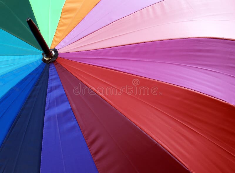 Kleurrijke stoffenparaplu stock fotografie Kleurrijke stoffenparaplu stock fotografie