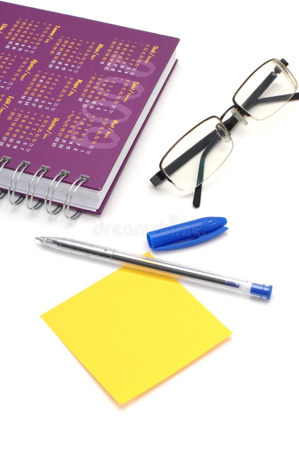 Plaknotitie en dagboek stock fotografie