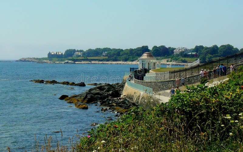 This is a portion of the 3.5 mile (5.6 km) Cliff Walk in Newport, Rhode Island. A good portion of this walk takes you along the Newport Coastline which is to the home to many famous mansions of Newport. I've taken this walk many times in my life and look forward to it, each and every time. It's a must do if you are visiting New England. So much history in this beautiful little village of Newport, Rhode Island. This is a portion of the 3.5 mile (5.6 km) Cliff Walk in Newport, Rhode Island. A good portion of this walk takes you along the Newport Coastline which is to the home to many famous mansions of Newport. I've taken this walk many times in my life and look forward to it, each and every time. It's a must do if you are visiting New England. So much history in this beautiful little village of Newport, Rhode Island.