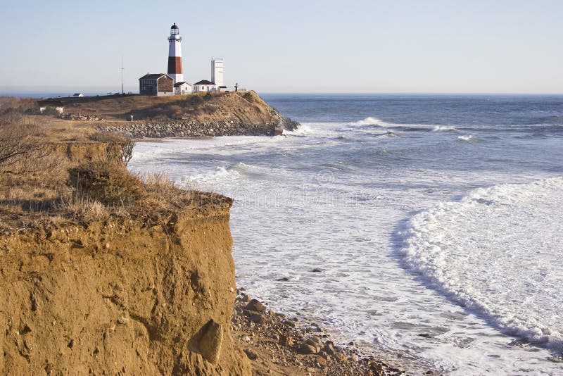 From the cliffs of Camp Hero to the Montauk Point Lighthouse. The lighthouse overlooks the Atlantic ocean. Long Island, NY. From the cliffs of Camp Hero to the Montauk Point Lighthouse. The lighthouse overlooks the Atlantic ocean. Long Island, NY