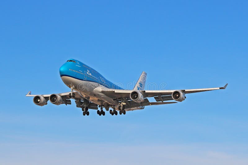 A KLM Royal Dutch Airlines Boeing 747-400M Combi photographed on final approach to Toronto Pearson International Airport YYZ. This jumbo jet sports a special 100 years livery, commemorating the Netherlands based airlines first flight in 1920. A KLM Royal Dutch Airlines Boeing 747-400M Combi photographed on final approach to Toronto Pearson International Airport YYZ. This jumbo jet sports a special 100 years livery, commemorating the Netherlands based airlines first flight in 1920.