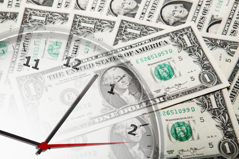 Clock on the background of banknotes dollars close up. Clock on the background of banknotes dollars close up