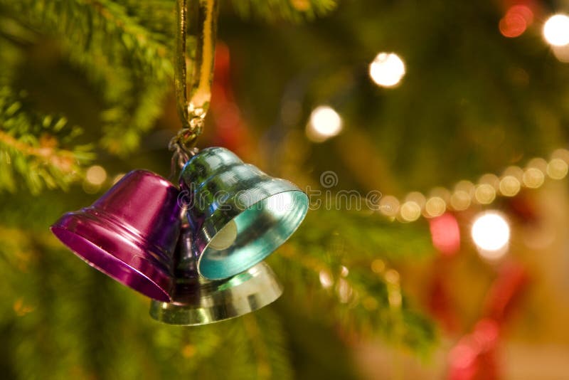 Christmas bells hanging on tree. Christmas bells hanging on tree