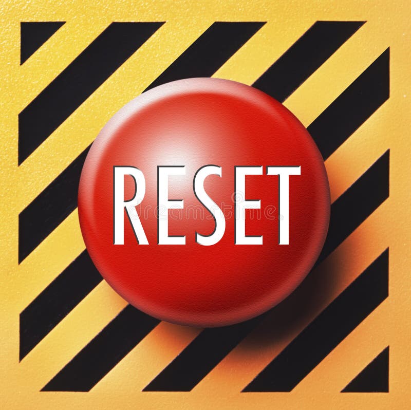 Red button with reset in white letters on diagonal orange and black background. Red button with reset in white letters on diagonal orange and black background