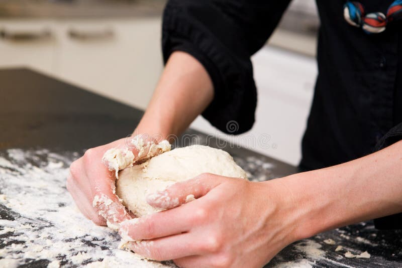 Kneading Dough with Hands stock image. Image of baking 3191571
