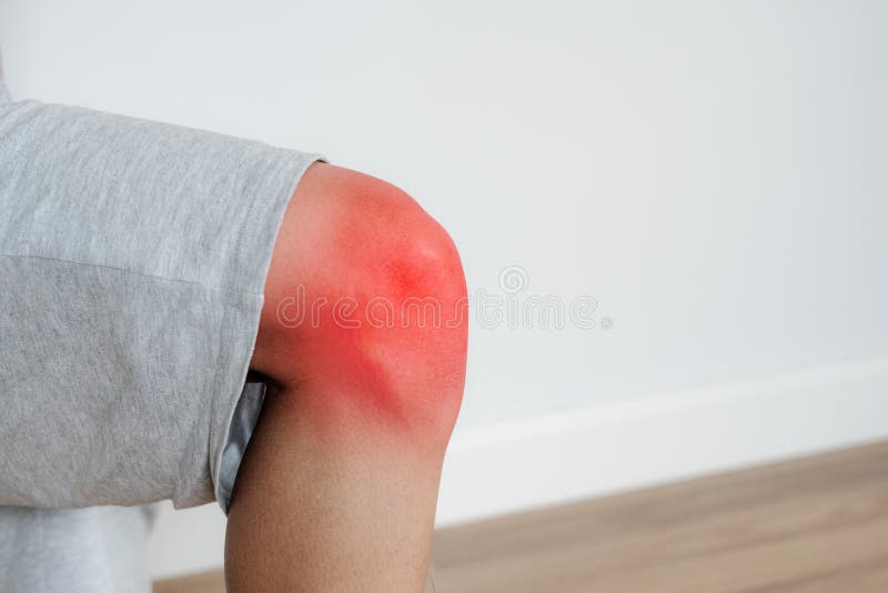 Knee Joint Pain, a Man Knee with Red Highlights Concept of Knee and
