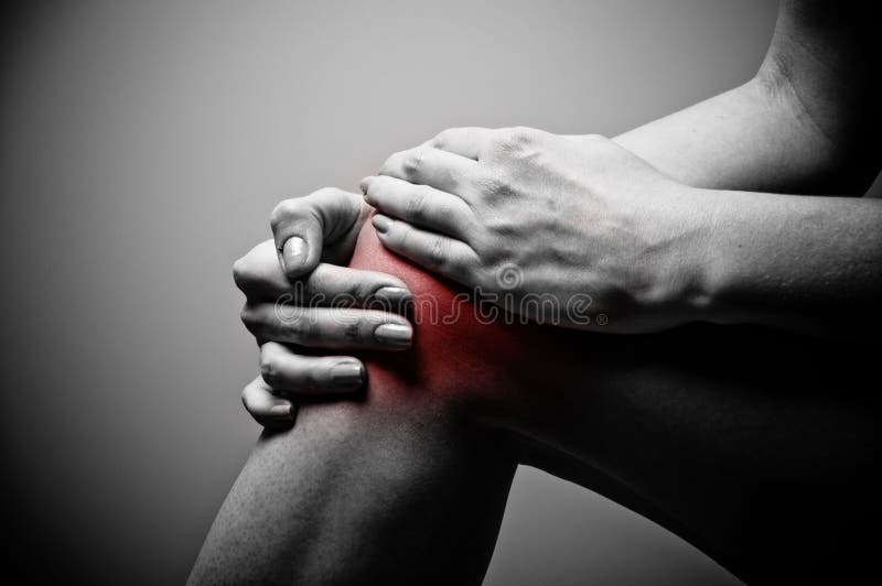 Young woman having knee pain