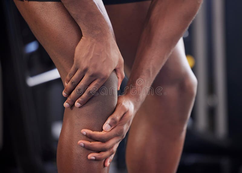 Knee pain, fitness injury and black man legs in sport health club. Closeup of runner athlete leg medical emergency
