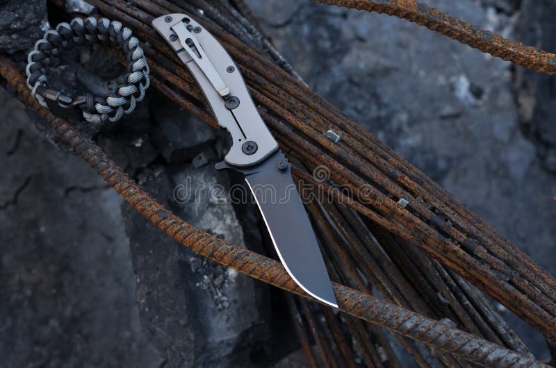 Knife with a Clip. Aluminum Handle and Clip on Knife Stock Photo