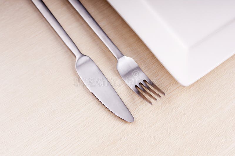 Knife, Fork and Plate stock image. Image of catering 26307233