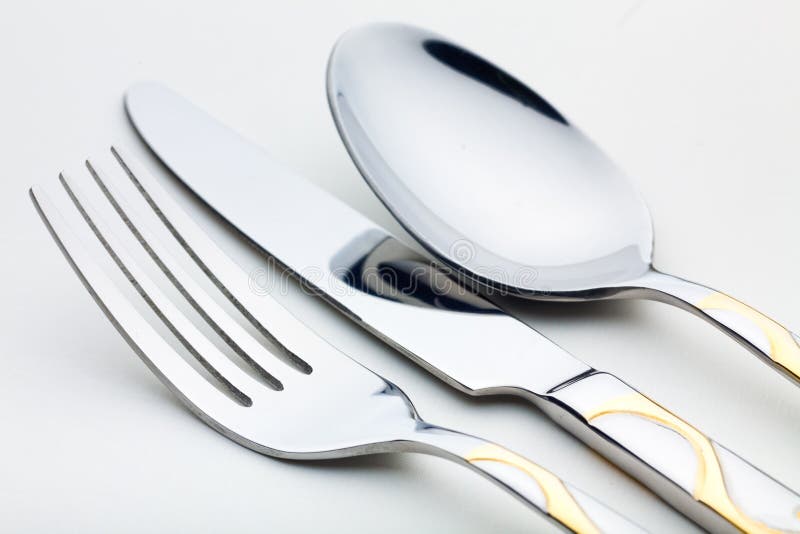Knife, Fork and Spoon with Linen Serviette. Stock Image Image of