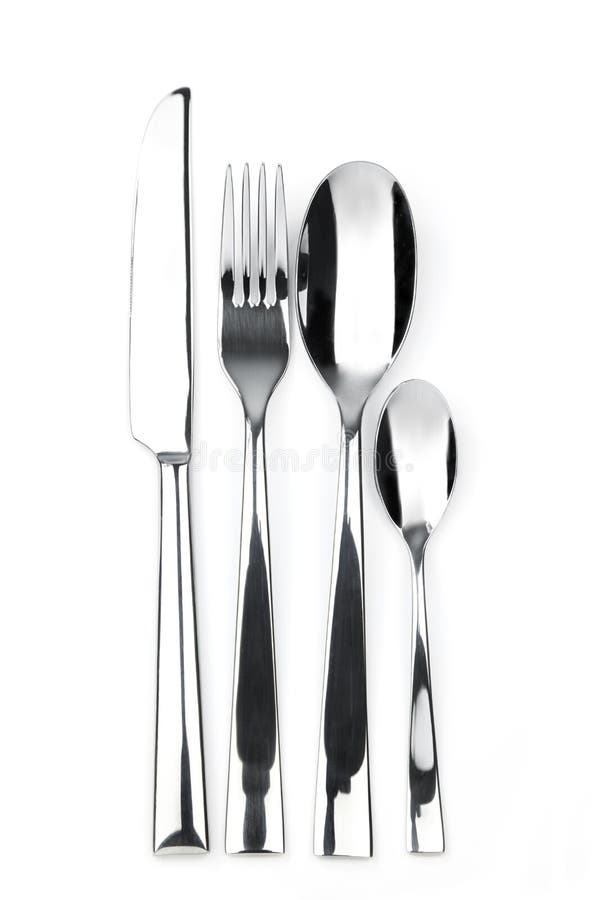 Knife, fork, spoon and teaspoon stock photography