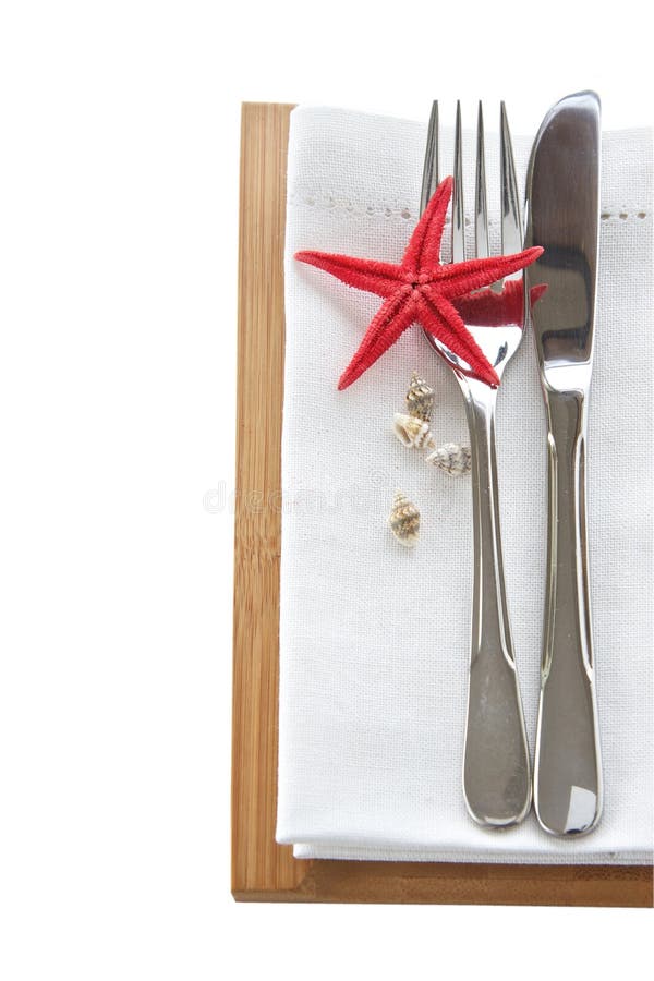 Knife and fork with starfish table setting