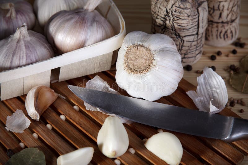 Knife with garlic stock image. Image of cooking, relish 22412181