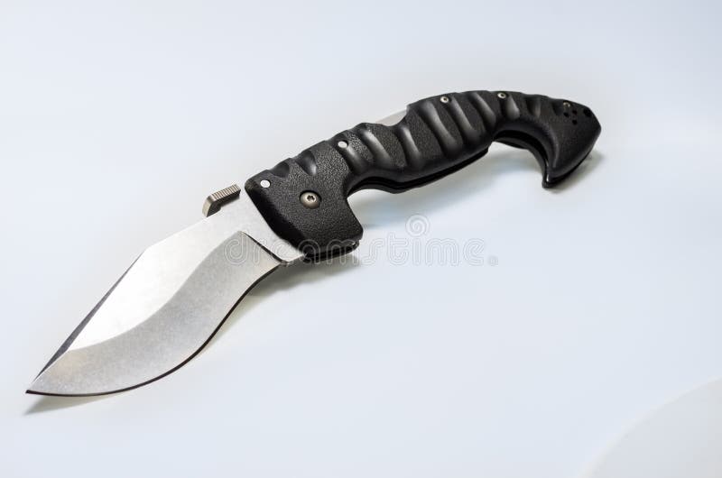 Knife with a Large Wide Blade. Knife on a Gray Background Stock Image