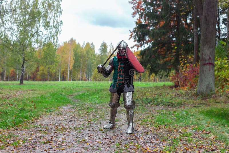 Knight Fencing with Sword and Shield Battle Action Medieval Stock Image