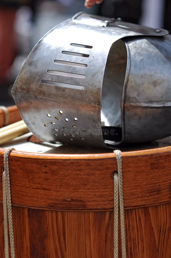 Military metal knight's helmet and wood drum. Metal steel drum stock images, royalty-free photos and pictures