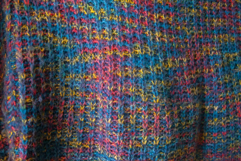 Knitted fabric texture. Closeup view of multicolored fabric jersey. Multicolor abstract background and texture for designers. Colo stock images