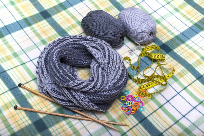 Knitted scarf from wool mixture gray two-tone stock photography Knitted scarf from wool mixture gray two-tone stock photography