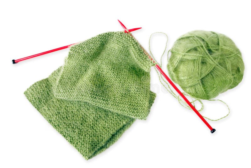Pletenie zelená načechraný vlnená šatka, s červeným ihlice na pletenie.