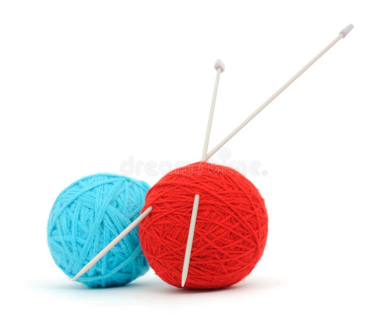 Knitting needles and a balls of wool on a white. Knitting needles and a balls of wool on a white.