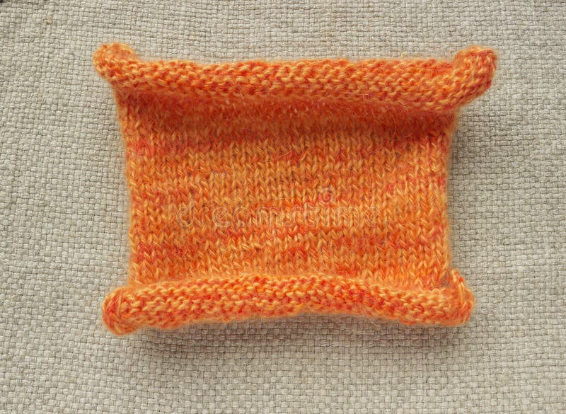 Knitting orange mohair wool