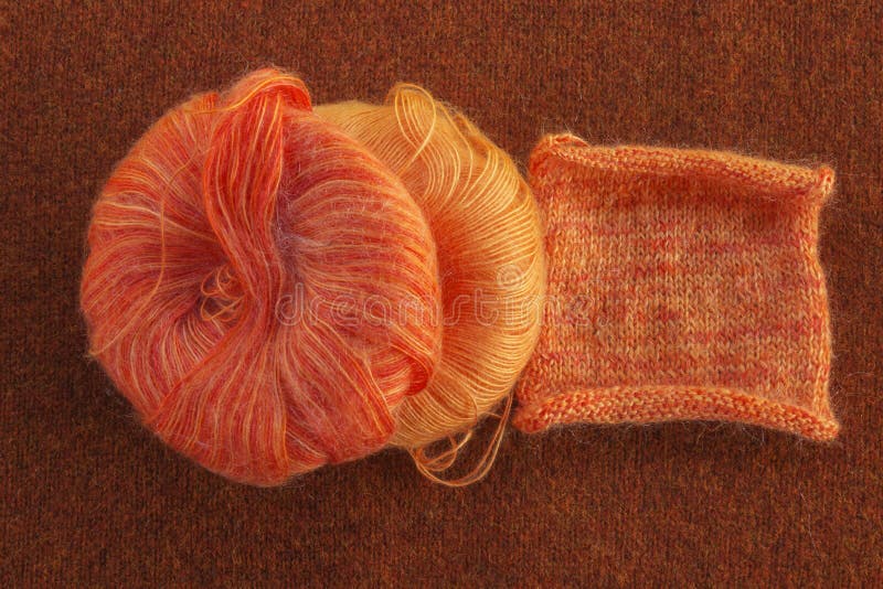 Knitting orange mohair wool